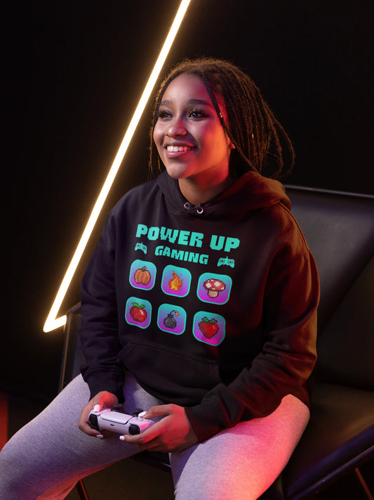 Power Up Gaming Icons | Bunter Retro-Pixel Hoodie – schwarz Hoodie als weiblich-Mockup, modernes Gaming-Design und hochwertiges Produktfoto.